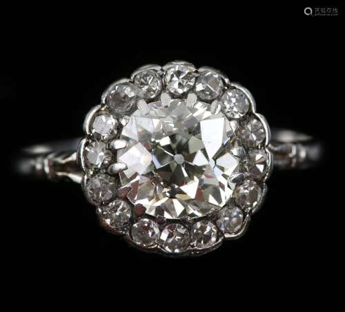 Early 20th C diamond cluster ring, central old cut diamond surrounded by Swiss cut diamonds,