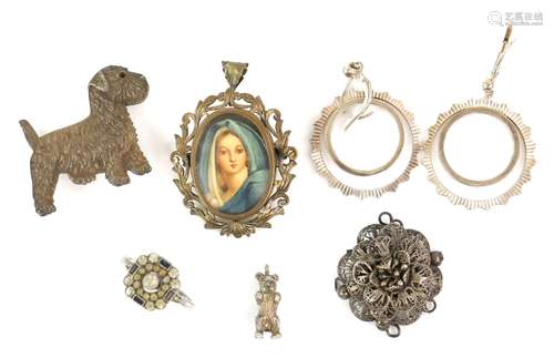 A group of costume jewellery, a silver terrier brooch, a pair of earrings, silver bear charm,