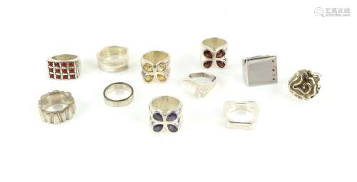 Selection of twenty-one silver rings, including some stone set rings, ring sizes J-S. Gross weight