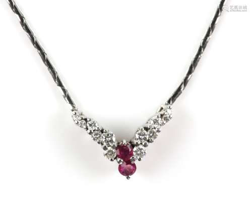 Modern ruby and diamond necklace, set with two round cut rubies and twelve round brilliant cut