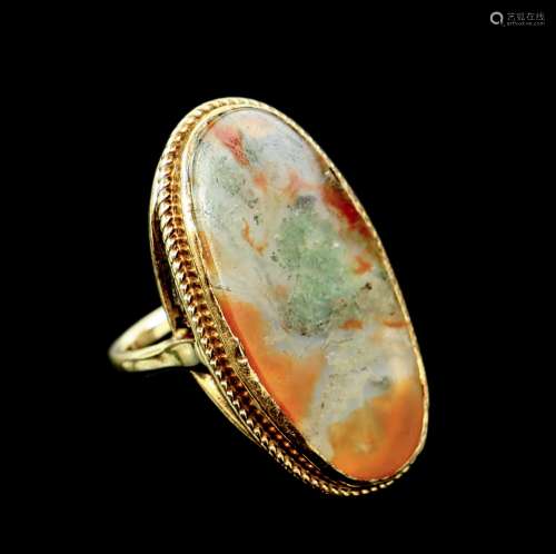 Vintage panel ring, oval cut moss agate, with a wirework border, mounted in 9 ct yellow gold,