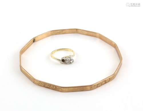 Three stone diamond ring, in 18 ct gold, centre stone estimated at 0.25 carat, ring size L and a