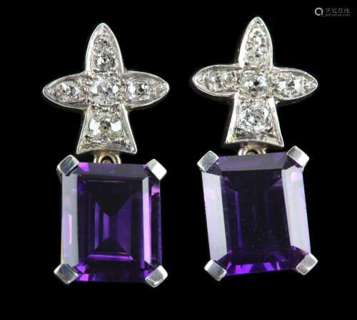 A pair of amethyst and diamond earrings, rectangular step cut amethyst drops, surmounted by a old