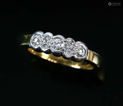 Modern diamond seven stone ring, estimated total diamond weight 0.30 carats, mounted in 18 ct,