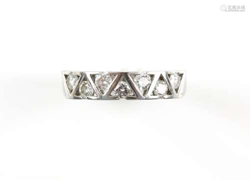 Contemporary diamond half eternity ring, seven round brilliant cut diamond, estimated diamond weight