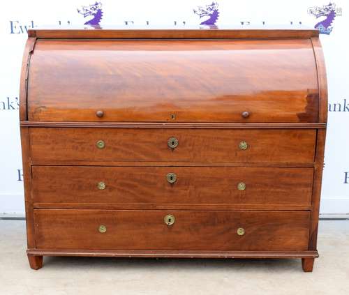 19th century mahogany cylinder bureau, the cover enclosing central cupboard with figural inlaid