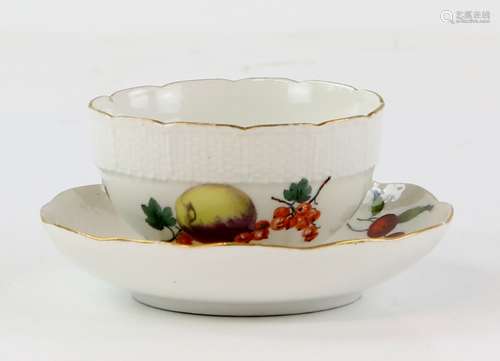 German porcelain tea bowl and saucer with scalloped edge, decorated with butterflies, lemon and