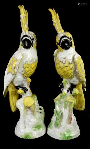 Two 20th century Dresden Parrots on perches. 47cm high Blue cross mark with S