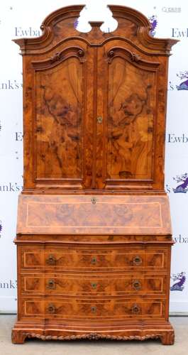 19th century style walnut bureau cabinet, the panelled cabinet doors enclosing central cupboard