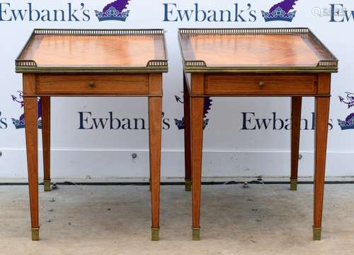 Pair of French satinwood and rosewood crossbanded side tables with brass galleried tops on square