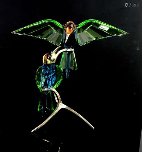 Swarovski pair of Bee-eaters Peridot, on chrome branch-type base, with box, h29cm