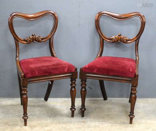 Set of six mahogany balloon back dining chairs with drop in seats on turned legs