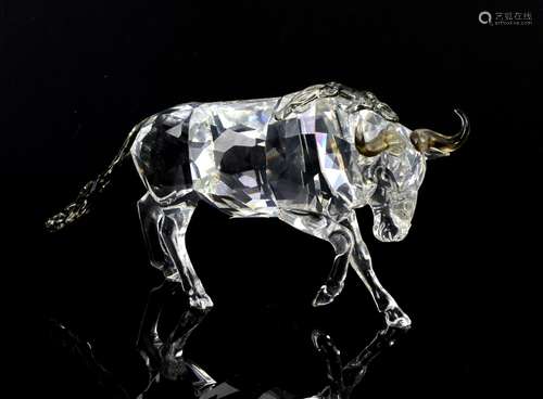 Swarovski gnu or wildebeest no. 933662, with box, and silver crystal model of mother and baby