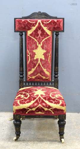 19th century ebonised high back chair with padded back and seat on turned legs Item is