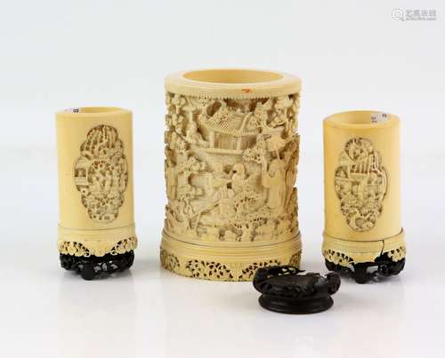 Late 19th century / early 20th century Chinese ivory tusk vase deeply carved with figures in a