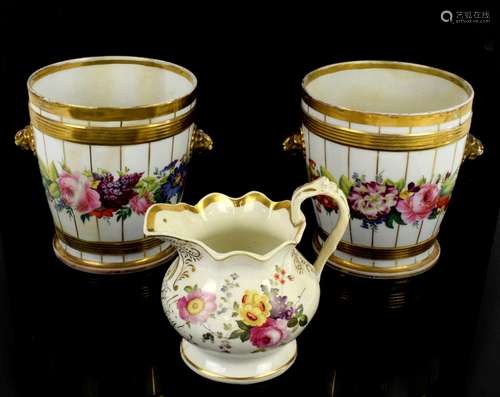 Pair of porcelain cache pots decorated with spring flowers and gilded bands, each 16.5cm high