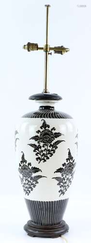 A Cizhou style vase, decorated with bold floral designs; mounted for use as a lamp with metal