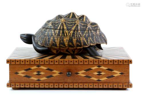 Early 20th century tortoiseshell jewellery box made from a complete shell, with hinged cover and