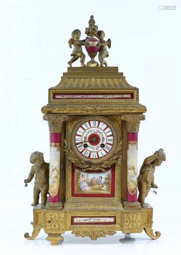 19th century French gilt metal mantel clock inset with red ground porcelain plaques decorated with