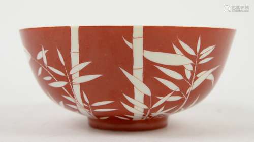 An orange-red ground bowl, decorated with bamboo; the base with underglaze blue six-character mark