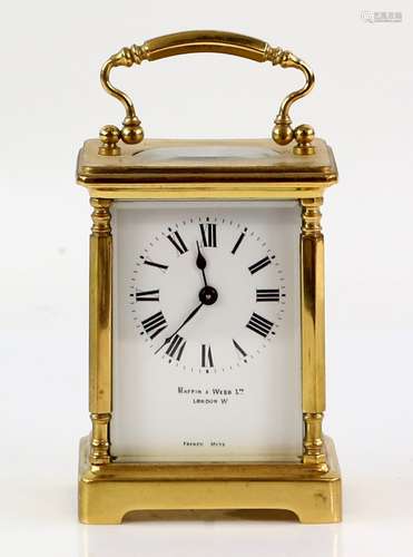 French brass carriage clock retailed by Mappin and Webb with corner column supports 11 cm high