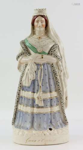 Large Staffordshire figure of Queen Victoria in her wedding dress labelled 'Queen of England', 44cm