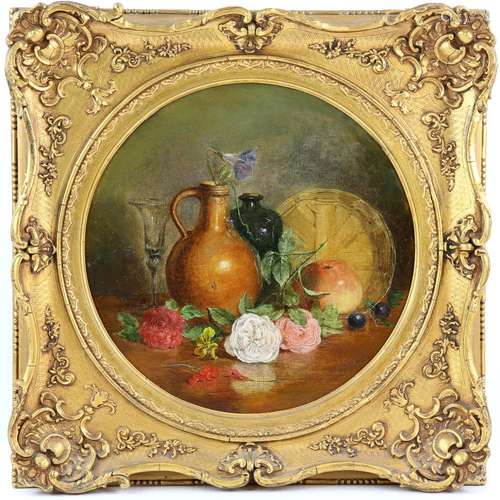 Ellen Ladell (British, 1835-1928), still-life with flask, wine glass and fruit in a circular mount,