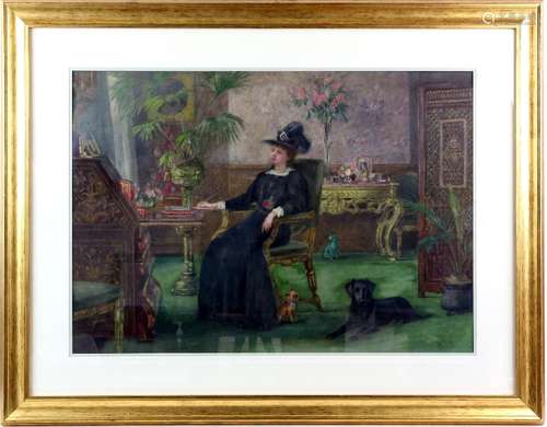 Late 19th/early 20th century interior scene with a lady sitting at her writing bureau and two dogs