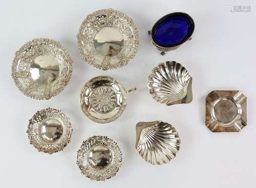 Selection of silver items including two pairs of pierced bonbon dishes, a pair of shell butter