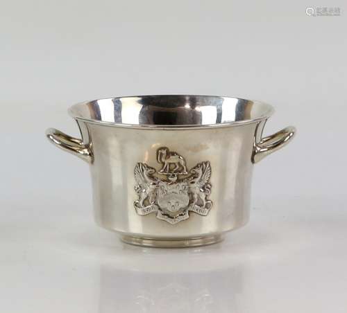 Victorian twin-handled silver bowl, with embossed figure on one side and embossed crest on the