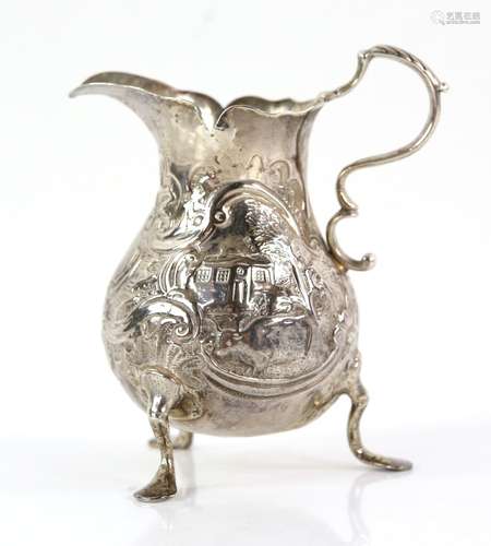 Victorian silver cream jug, London circa 1750, marks rubbed, with later embossed scene of a cow in