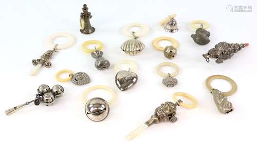 Collection of silver and white metal teething rings and children's rattles, to include a Chinese