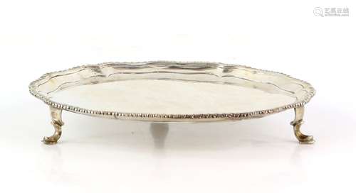 George III silver salver, by Richard Rugg I, London 1771, with shaped circular gadrooned border,