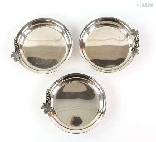 Turkish set of three silver wine bottle coaster, each plain circular coaster decorated with