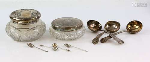 Selection of silver and silver-mounted items to include three graduated ladles, a pair of sugar