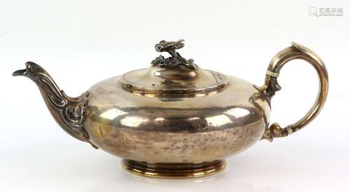 Victorian silver teapot, the squat circular body, with floral finial, the handle with ivory