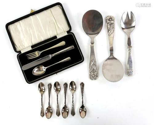 Danish Art Nouveau silver handled serving spork, a part silver three piece christening set and a set