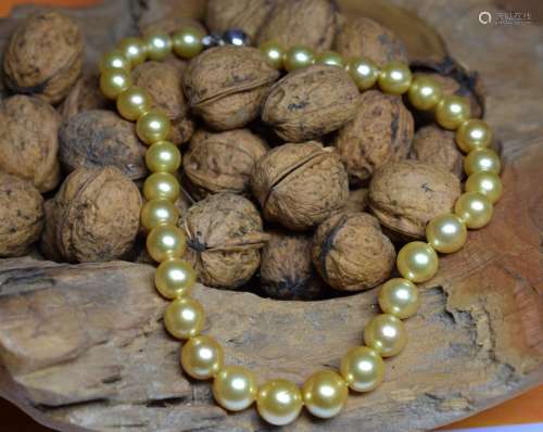 Important collier de perles GOLD (South sea) en chute de 10 - 12,5 mm. Couleur [...]