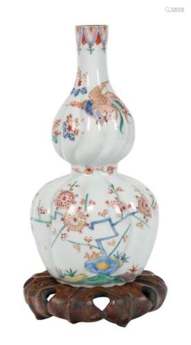 A kakiemon spirally moulded double gourd porcelain…