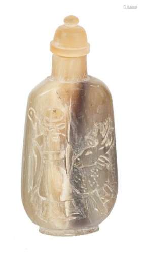 A fine Chinese snuff bottle in carved rhinoceros h…