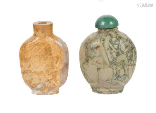 A pair of Chinese snuff bottles in carved pudding …