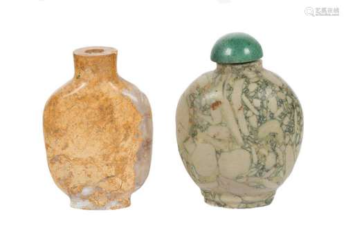 A pair of Chinese snuff bottles in carved pudding …