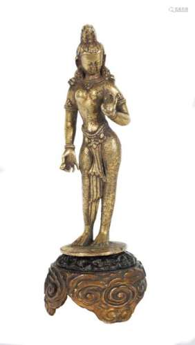 A gilt bronze figure of standing Tara. Tibet. 17th…