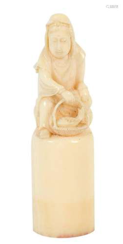 A carved ivory seal portraying a Guanyin. China. Q…