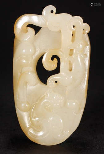 A HETIAN JADE PENDANT CARVED WITH DRAGON