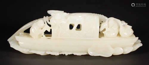 A HETIAN JADE PENDANT CARVED IN BOAT SHAPE