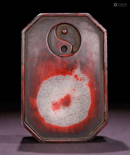AN INK SLAB CARVED WITH BAGUA PATTERN