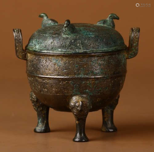 A BRONZE TRIPOD CENSER