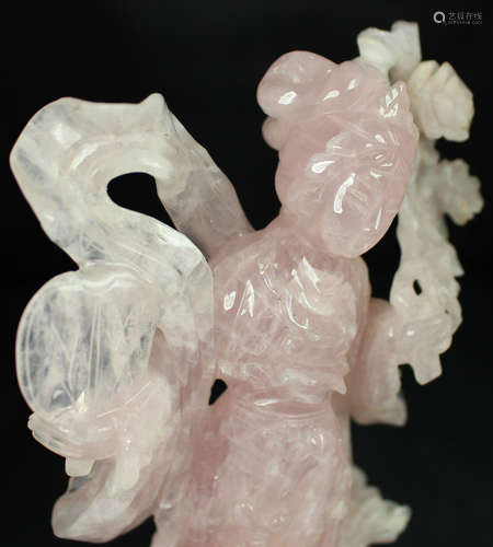 A ROSE QUARTZ STONE CARVED LADY FIGURE