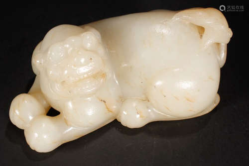 A HETIAN JADE BEAST PENDANT